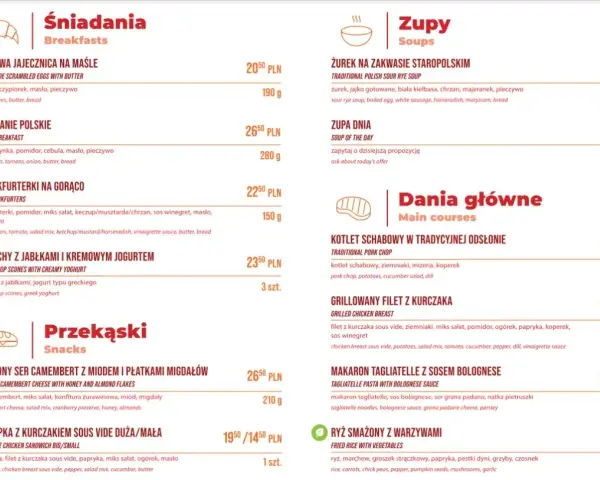 Menu z daniami głównymi, zupami i śniadaniami. Wśród pozycji: kotlet schabowy, makaron tagliatelle z sosem bolognese, żurek, jajecznica. Wagon restauracyjny oferuje różnorodne posiłki.